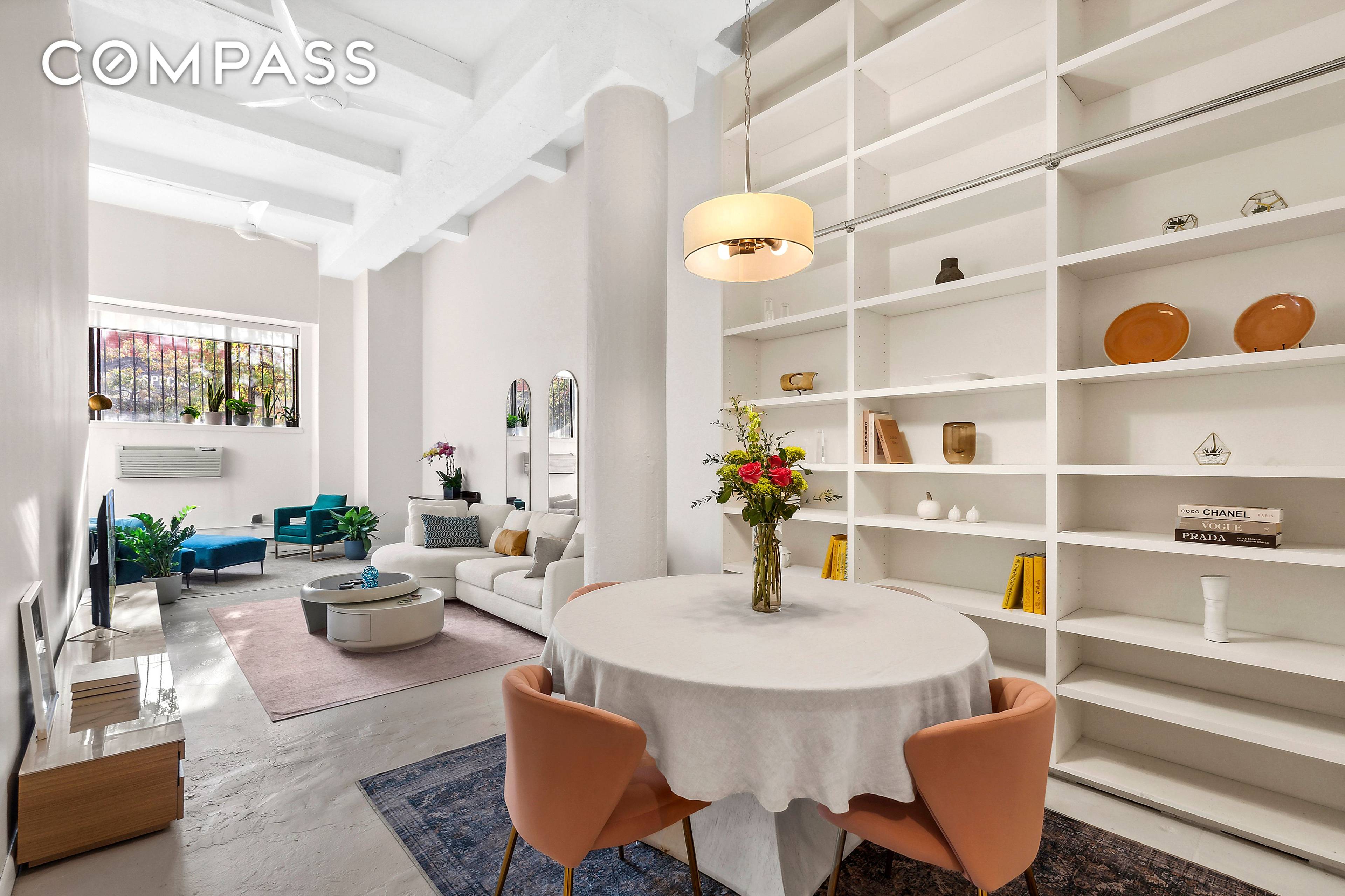 Discover the joy of loft living in this voluminous ground floor unit located in the prime neighborhood of Hell's Kitchen.