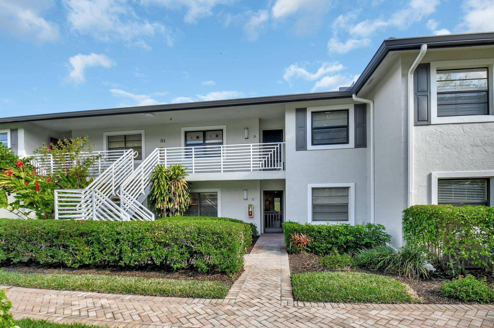 This beautifully renovated 2 bedroom, 2 bathroom main level condo offers modern elegance and effortless living.