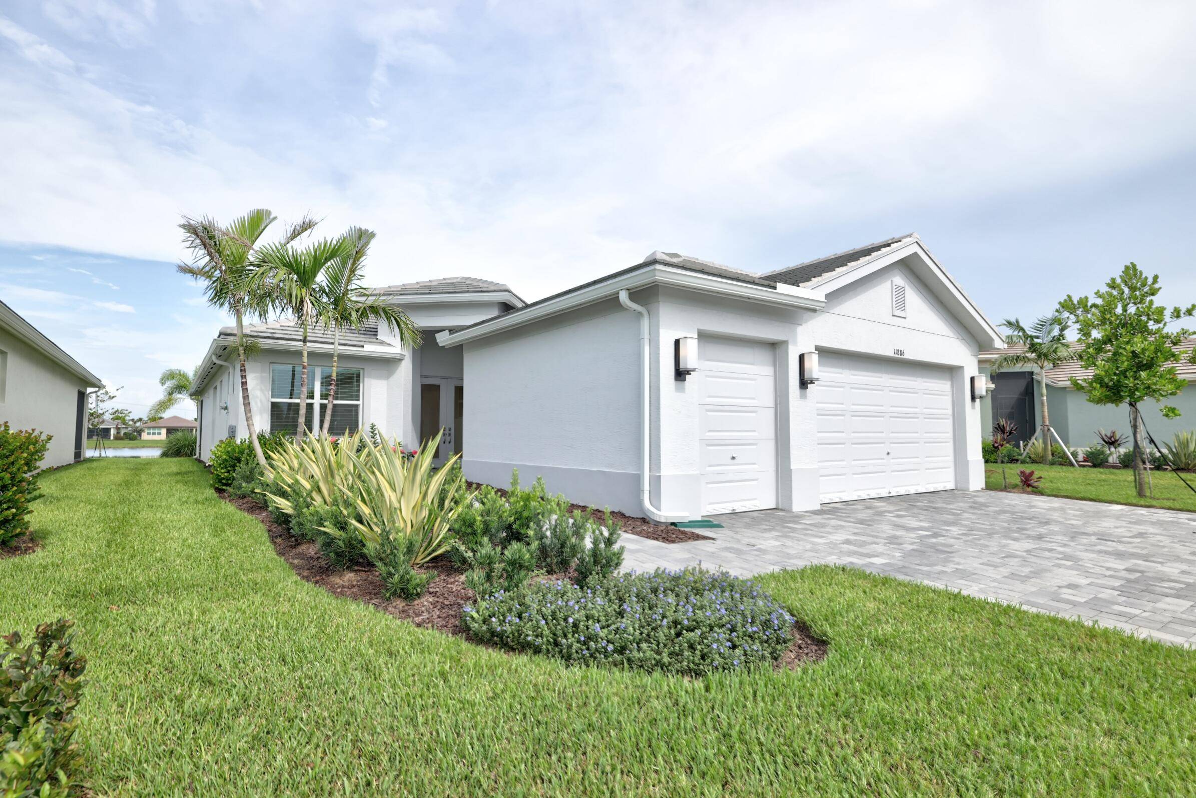 Experience resort style living in the esteemed Valencia Grove at Riverland, where luxury and comfort are woven into every detail of this exceptional lakefront Palazzo model.
