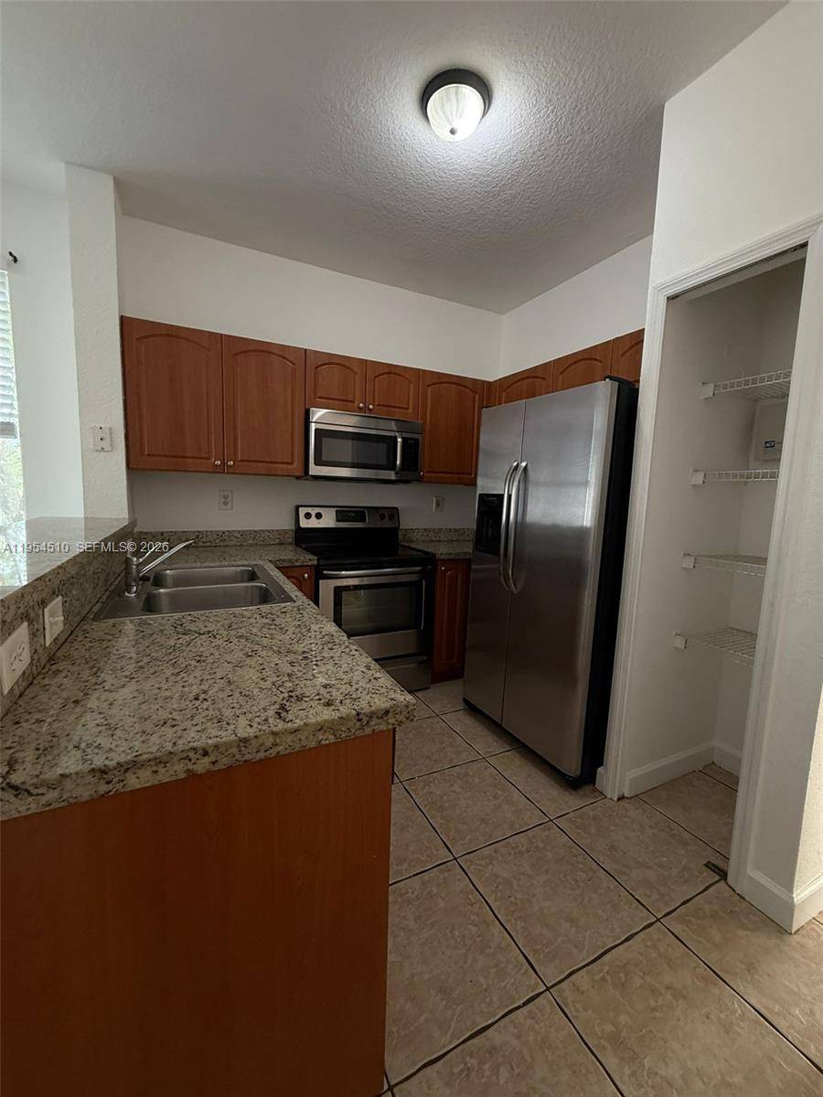 Spacious unit in convenient location near highways and shopping.