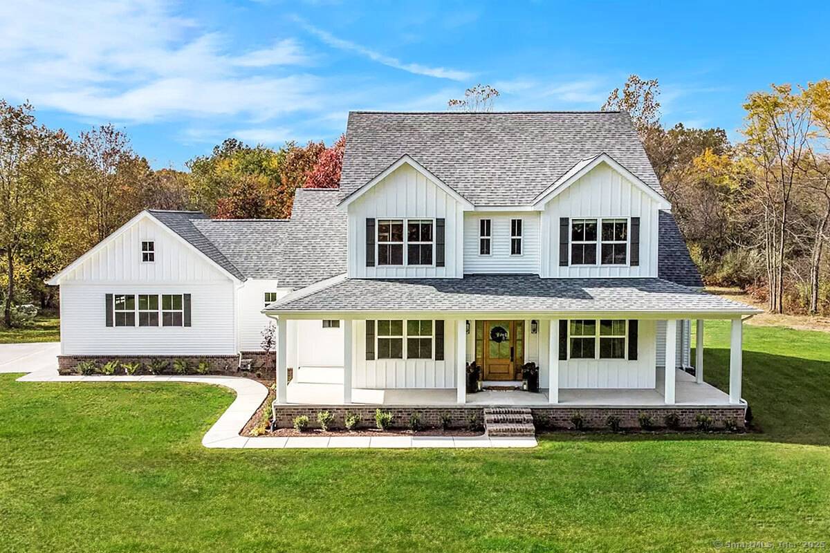 New Construction of a farm house style colonial in the prestigious Greenfield Hill section of Fairfield.