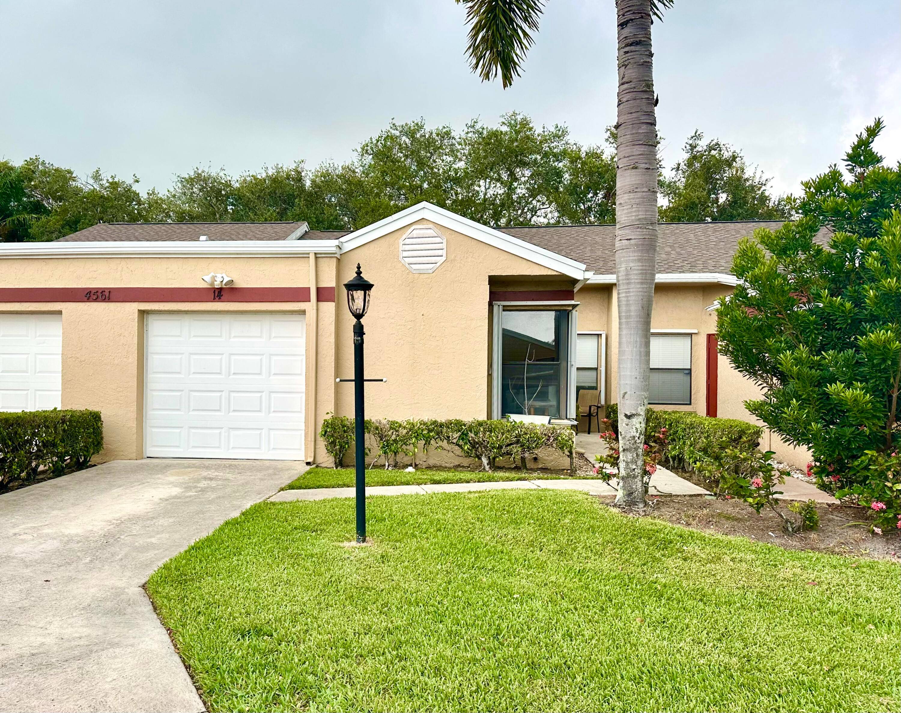 Discover this well maintained two bedroom, two bath single story serene townhome overlooking the water.