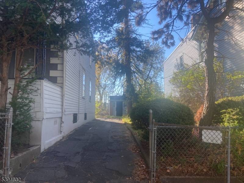 2 family in need of TLC. Double lot, Possible subdivision.