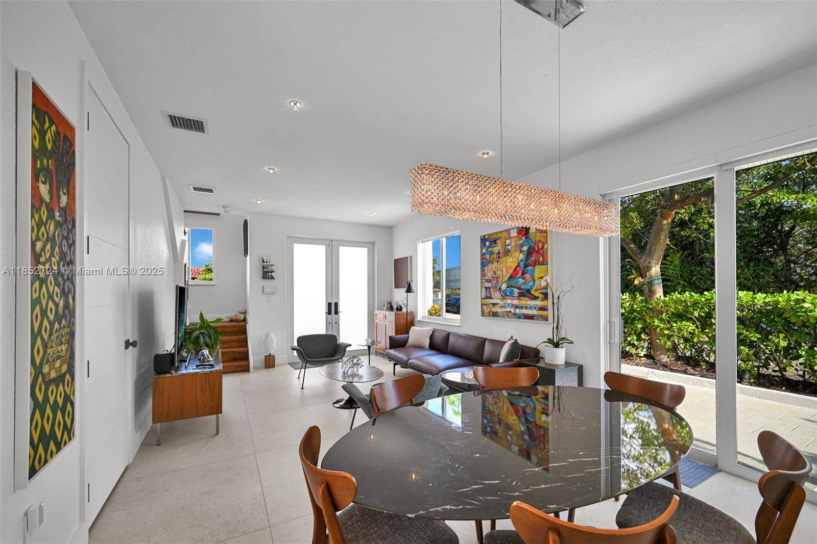 This beautifully updated townhouse is completely move in ready and offers a perfect blend of style and comfort.