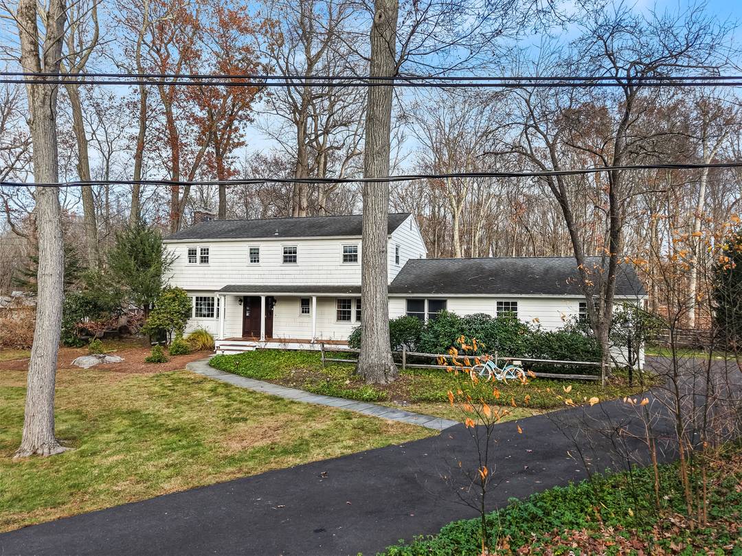 Welcome to an updated colonial style home in the highly sought after Saw Mill neighborhood !