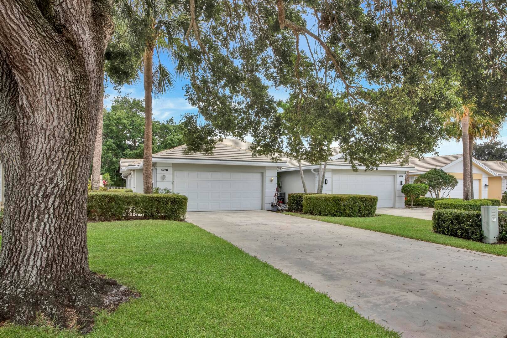 Welcome to this beautifully maintained 2 bedroom, 2 bath villa nestled in the sought after gated community of Garden Oaks.