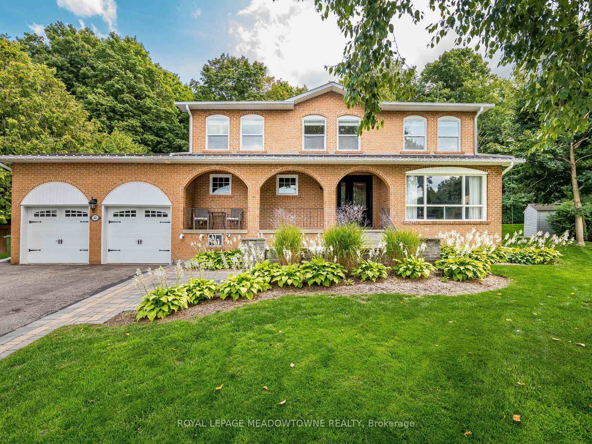 Welcome to 40 Hilltop Drive in the heart of Caledon East a stunning 4 bedroom, 3 bathroom home on nearly half an acre, backing onto serene green space and trails.
