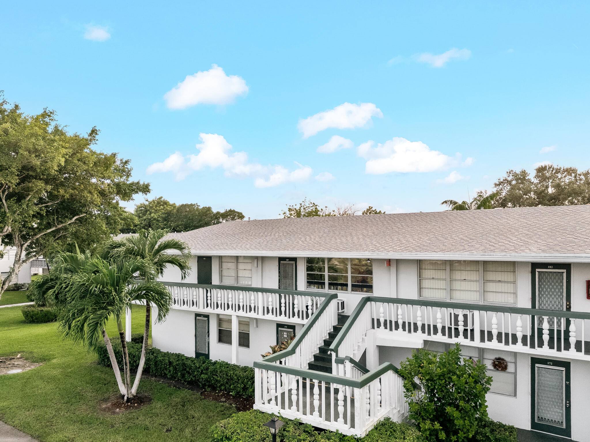 Step into this beautifully updated light and bright two bedroom, one and a half bathroom corner condo.