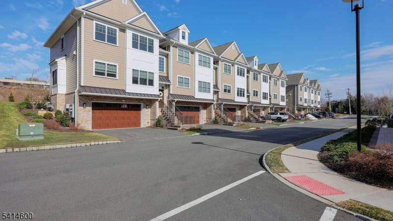 2023 End Unit Townhome with Premium Upgrades in Parc North community built by Garden Homes !