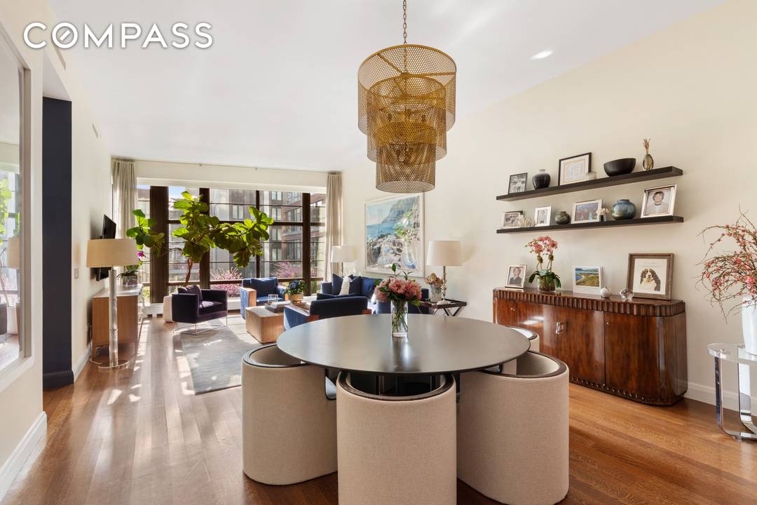 A private elevator opens into a grand foyer, leading to an oversized great room with floor to ceiling windows.