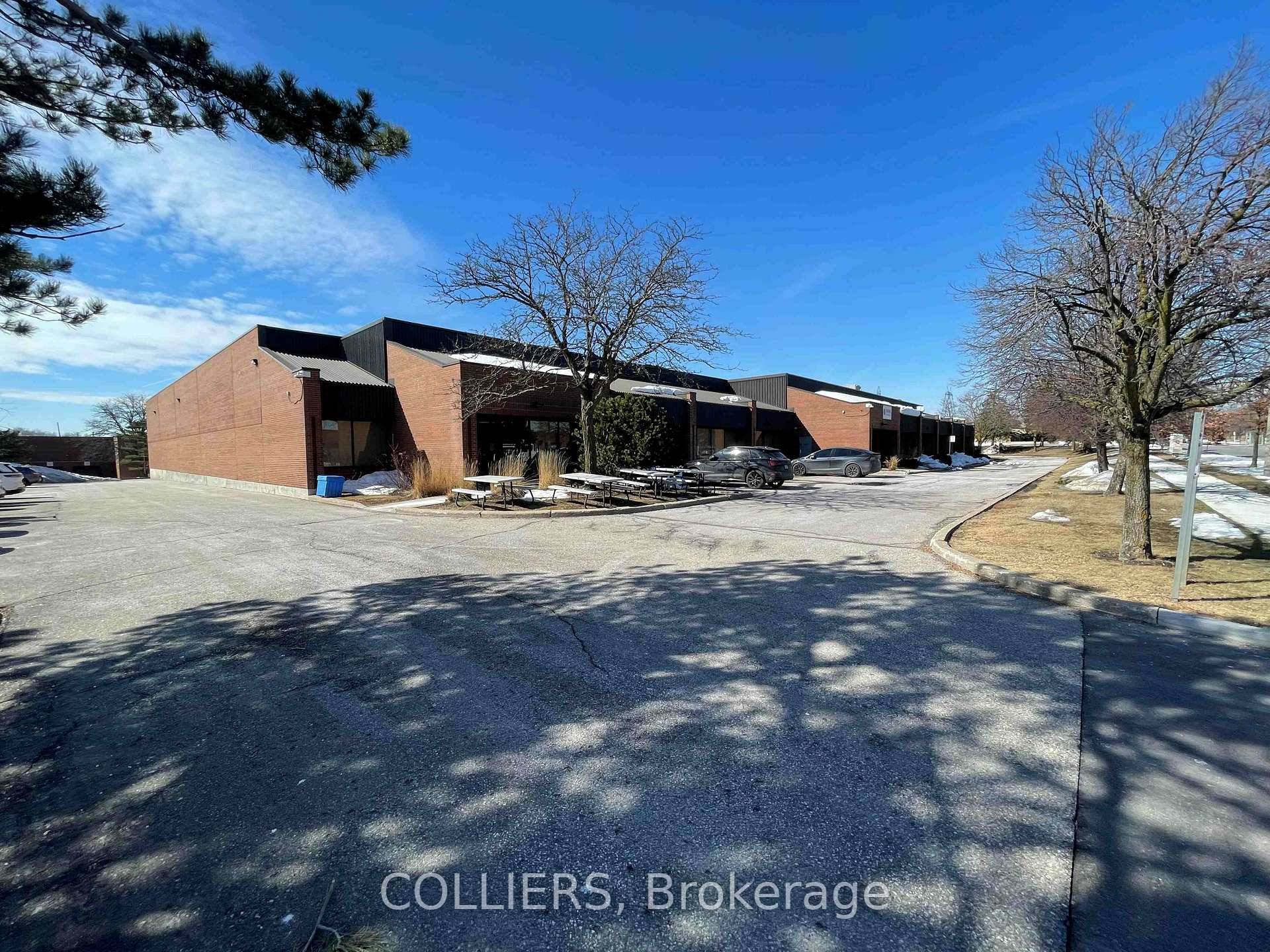 Freestanding building with clean and well lit warehouse space.