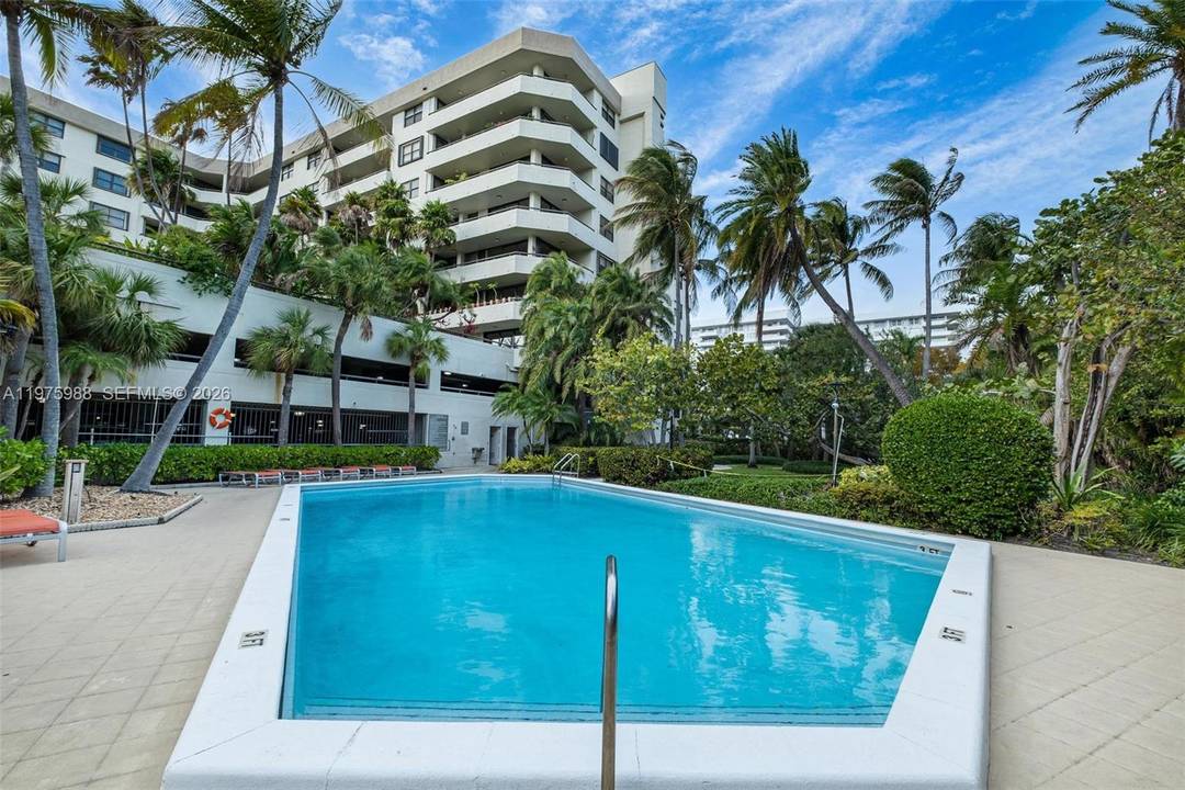Welcome to this bright and inviting 2 bedroom, 2 bathroom condo in the highly sought after Ocean Lane Plaza, a resort style community in the heart of Key Biscayne.