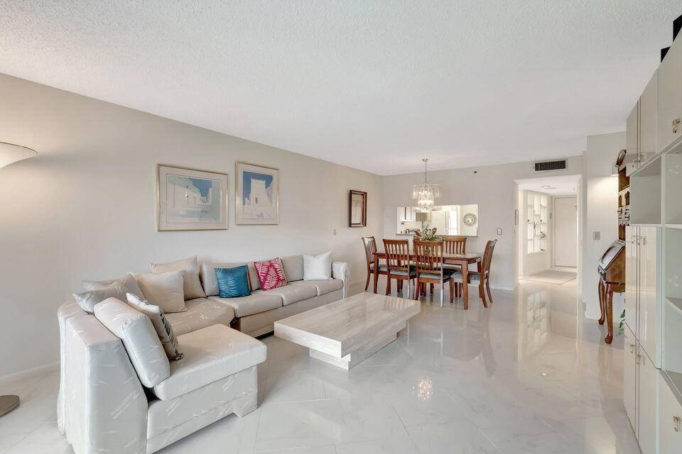 Welcome to 14475 Strathmore Ln 405, a gem in the Active ADULT COMMUNITY 55 of Huntington Lakes in Delray Beach, FL.