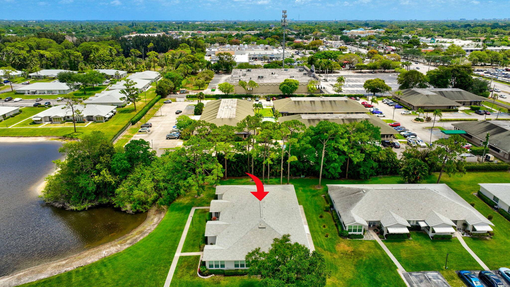 Great peaceful location of this spacious, bright, airy and updated villa facing a small lake.