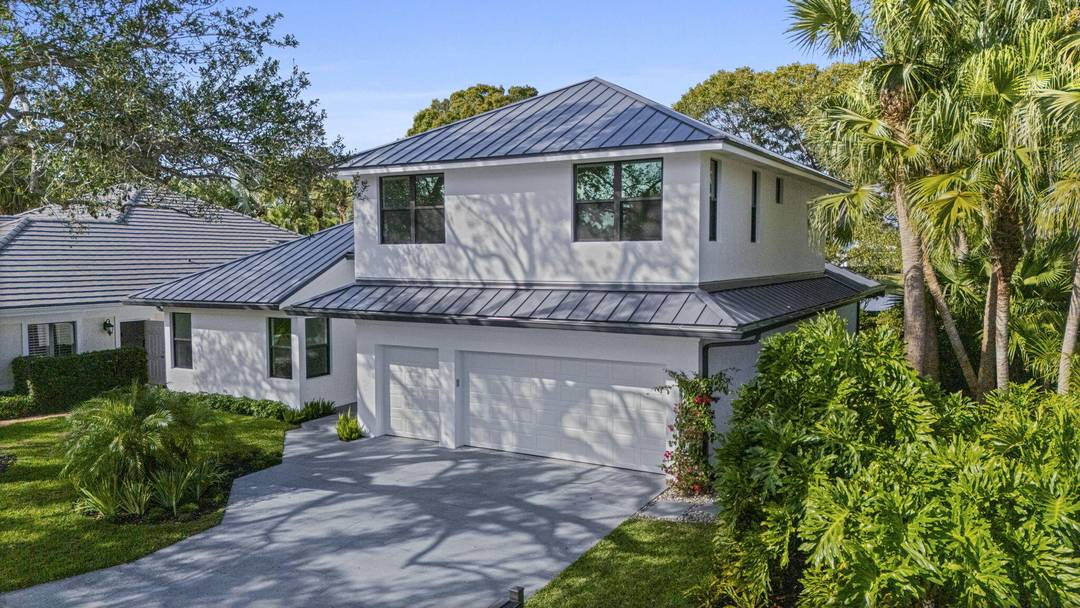 Newly renovated 4 bedroom, 4 bathroom home in prestigious gated Jupiter Community.