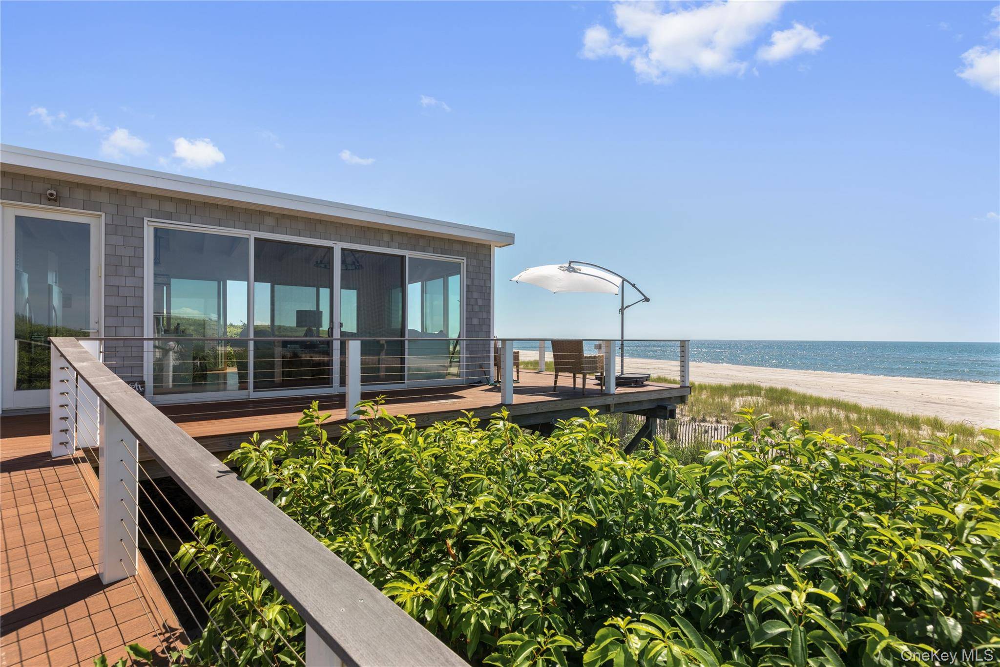 Spectacular Beachfront Home in Secluded Setting !