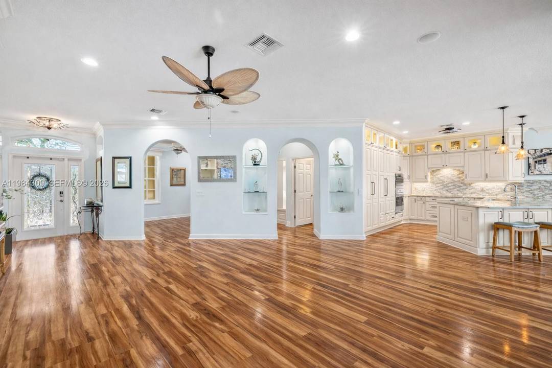 EXTRAS GALORE ! Fully custom lakefront luxury home in Herons Glen, completely reimagined with over 700, 000 in upgrades.