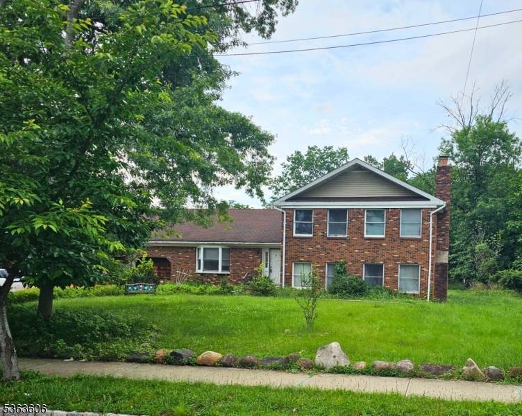 Investor Opportunity 4 Bed 3 Bath Split Level on Half Acre !