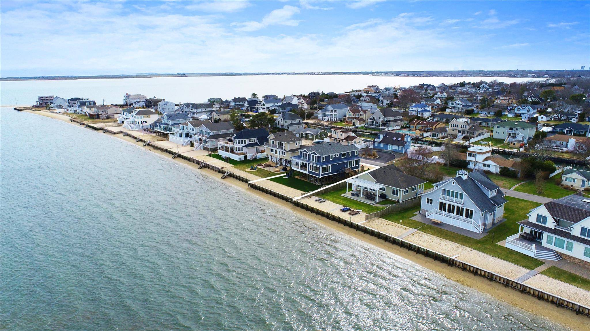 Experience exceptional waterfront living in the exclusive Shinnecock Shores community of East Quogue, Southampton.