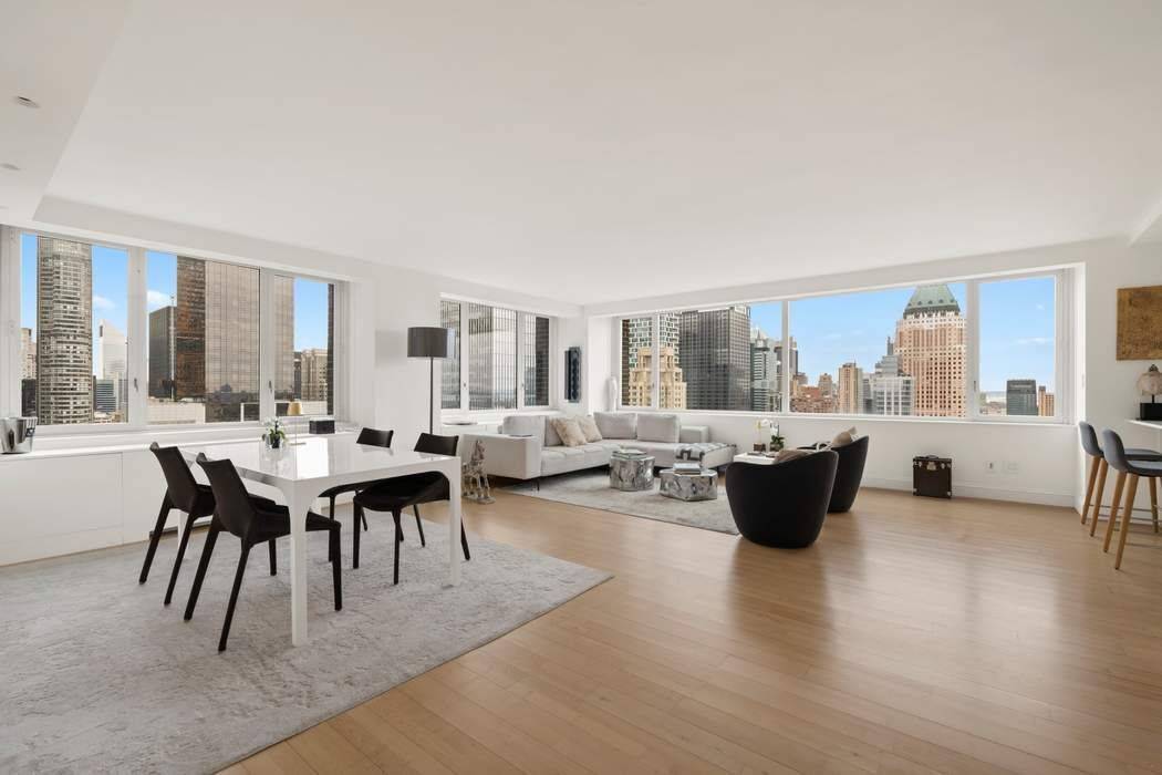 Live above it all in this exceptional high floor residence at the Sheffield Condominium, where breathtaking South and East exposures frame iconic New York City views from the 50th floor.
