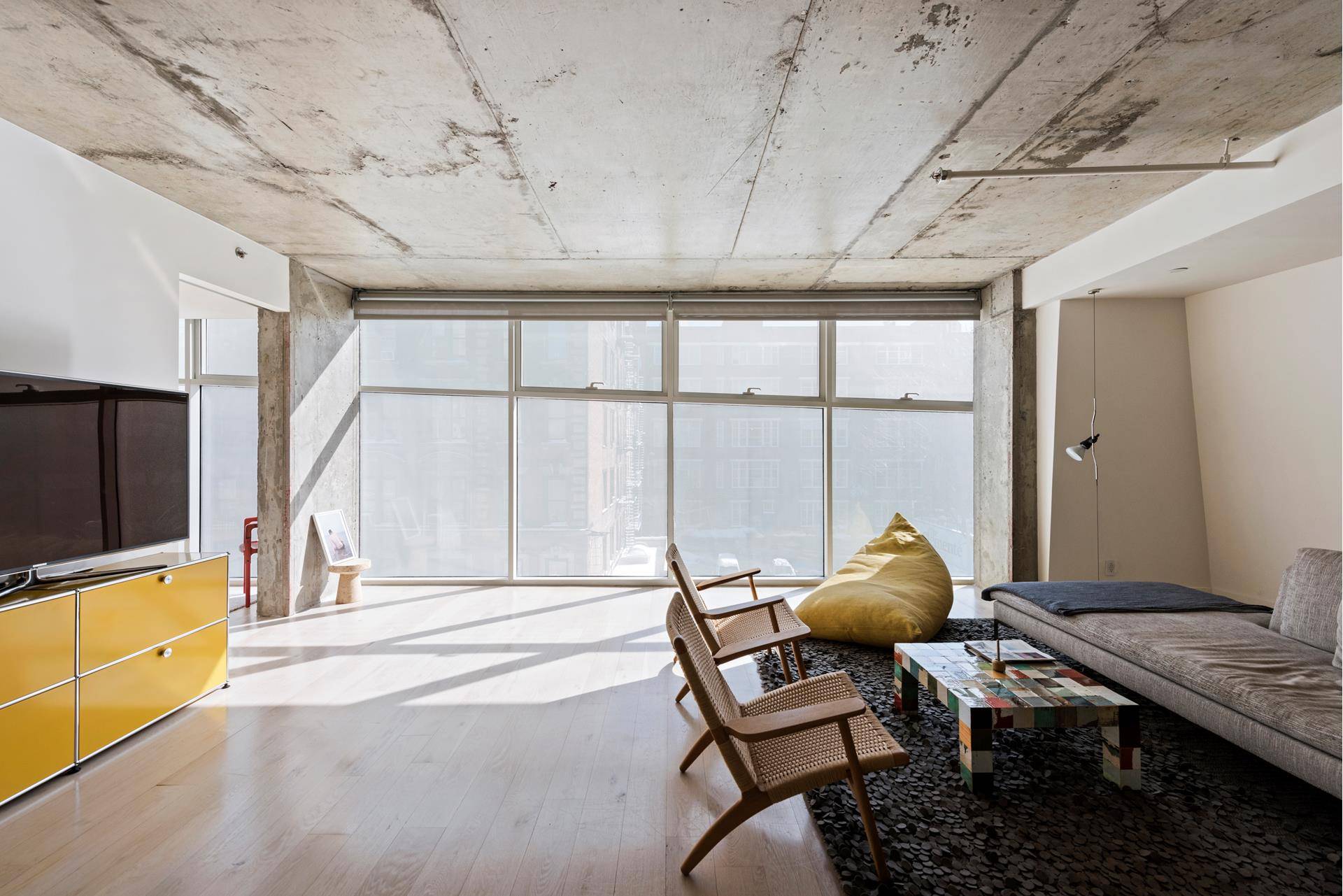 A custom designed loft, currently a two bedroom configured as a one bedroom with two baths at 115 Norfolk Street, a new construction condominium offering the most innovative contemporary architecture ...