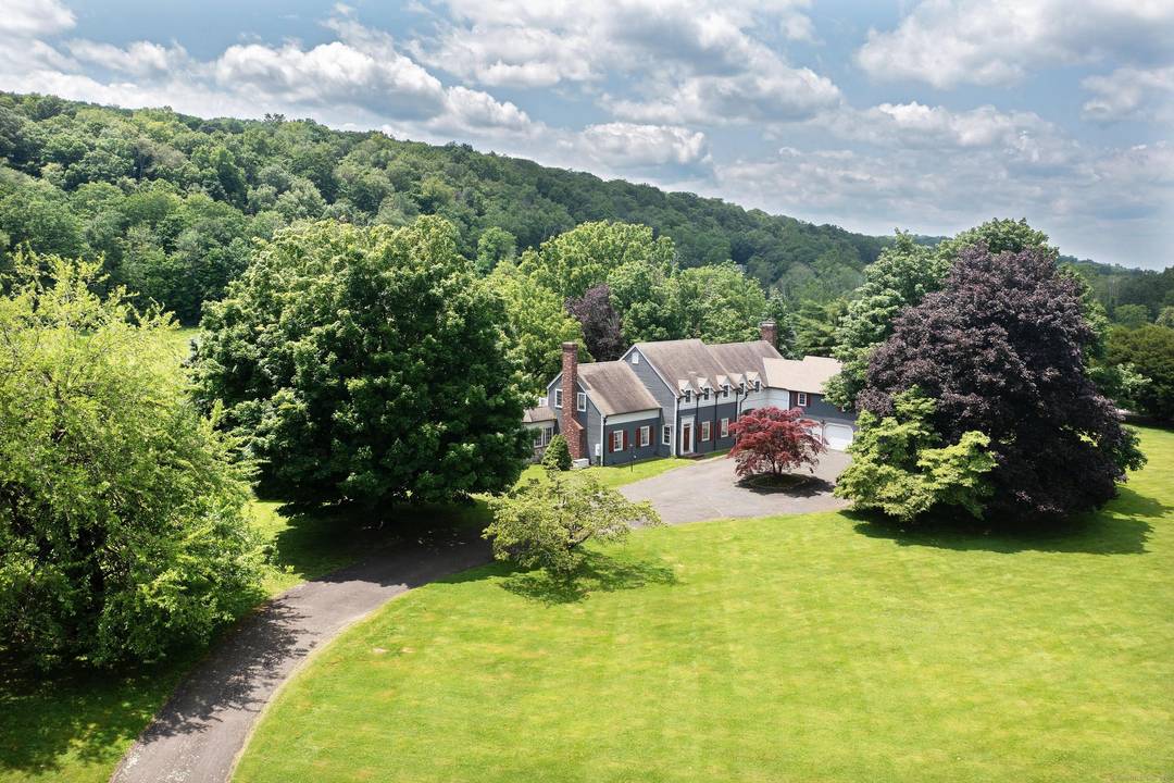 Welcome Home to this beautiful estate property, sited on 7.