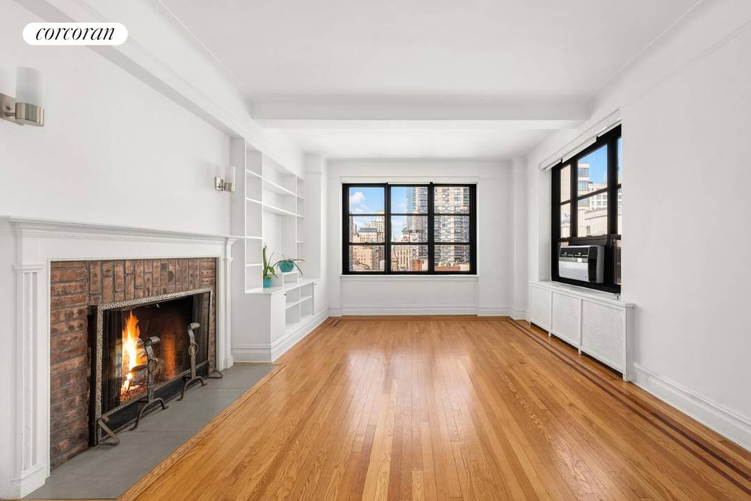 SPECTACULAR OPPORTUNITY IN GRAMERCY LARGE, BRIGHT, CHARMING 1 BDRM W WOOD BURNING FIREPLACE AND PRIVATE SOUTH FACING TERRACE.