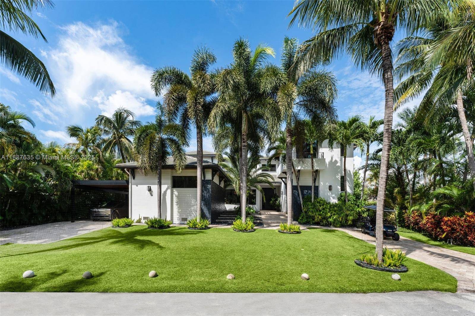 This stunning residence, set on an oversized 12, 262 SF lot, offers 5, 528 SF of beautifully designed interiors filled with natural light.