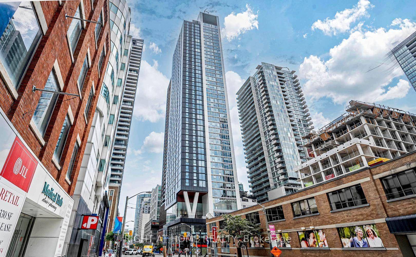 This stunning two bedroom, two bathroom condo offers breathtaking city views from the 38th floor and is less than two years old.