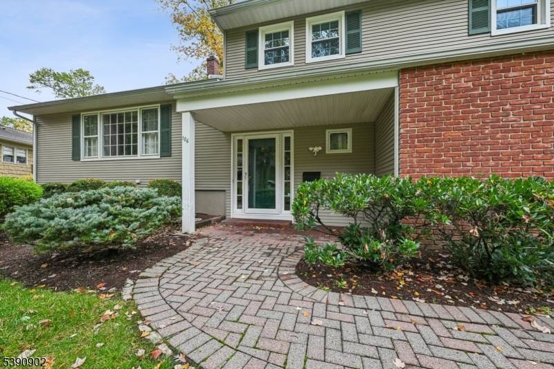 Welcome to 106 Stoneridge Rd in the desirable Tall Oaks section of New Providence.