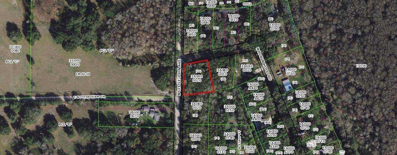 VERY NICE SIZE CORNER LOT OVER HALF AN ACRE PROPERTY SIZE IS.