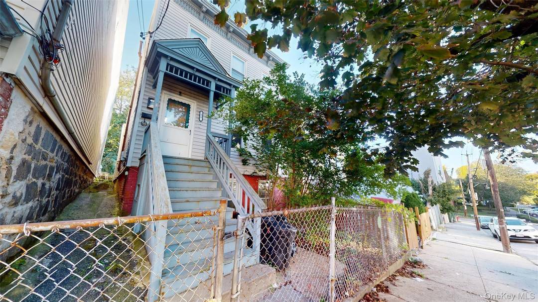 Discover a valuable investment opportunity or perfect owner occupant setup at 50 Croton Terrace in Yonkers.
