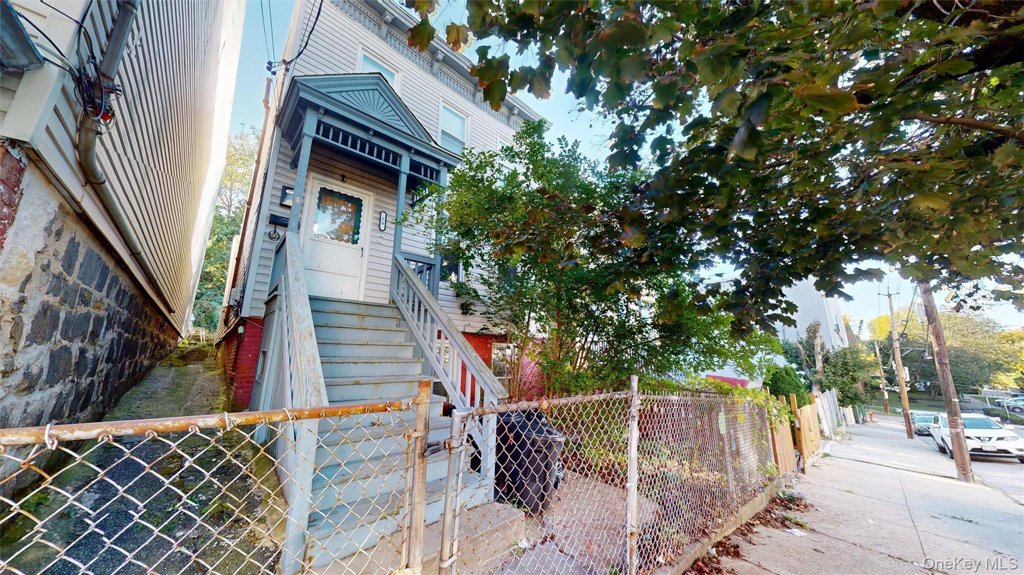Discover a valuable investment opportunity or perfect owner occupant setup at 50 Croton Terrace in Yonkers.
