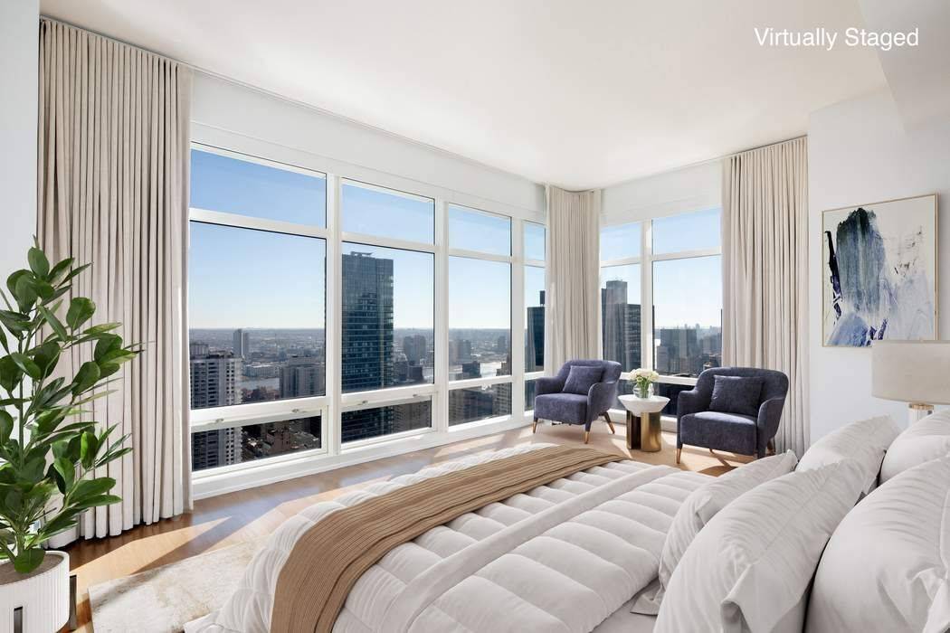 Residence 38D at One Beacon Court Condominium is a high floor corner two bedroom home with two full bathrooms and a powder room.