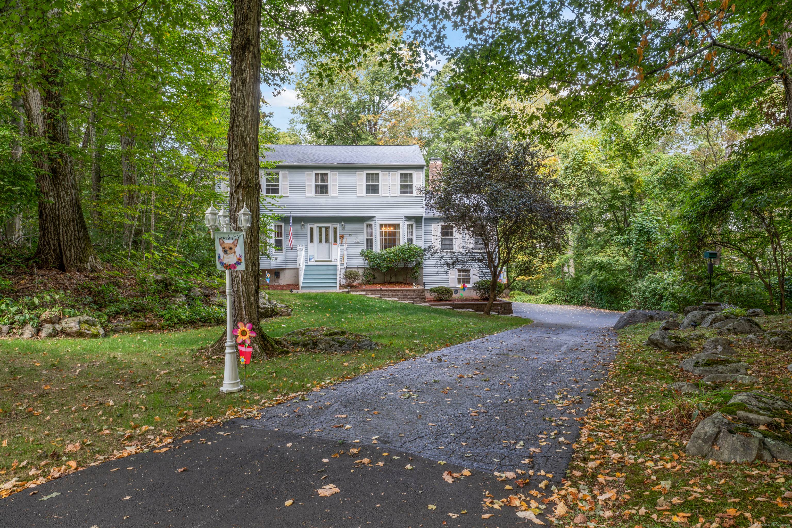 Tucked away at the end of a peaceful cul de sac in Danbury's desirable Miry Brook neighborhood, this 4 bedroom, 2.