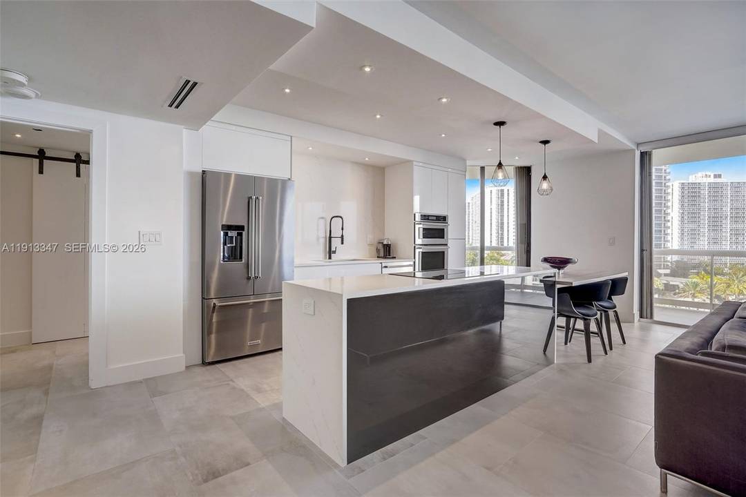 Spectacular Fully Remodeled 2 Bedroom, 2 Bath Condo with Panoramic Water, Golf amp ; City Views Seller Pays Special Assessment !