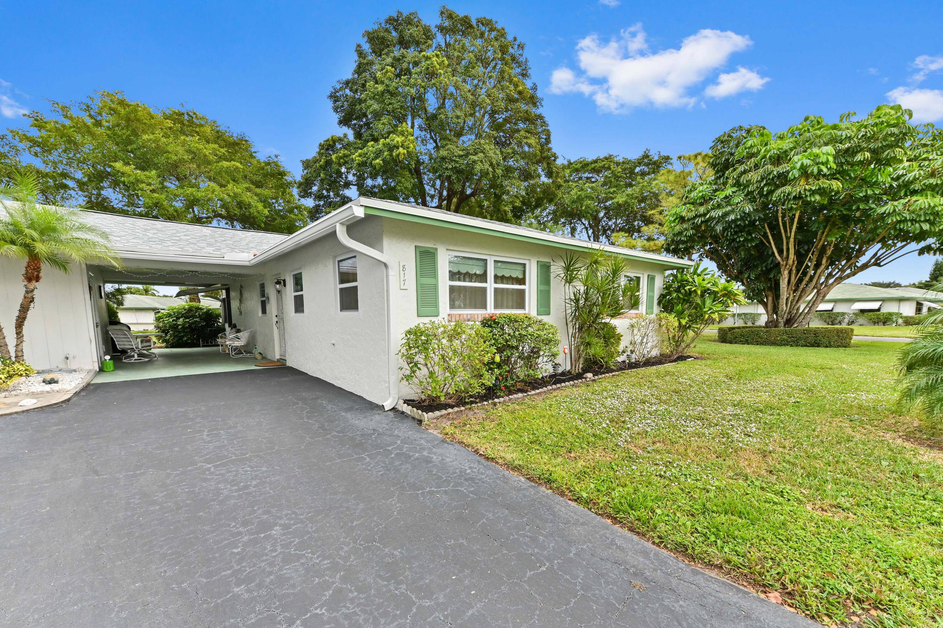 NEW ROOF 2024, NEWER IMPACT WINDOWS FULLY FURNISHEDThe villa at 817 Meadowlark Lane, located in the peaceful 55 community of Country Manors, Delray Beach FL, offers a distinct blend of ...