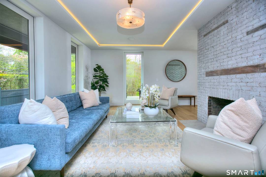 A sophisticated blend of past present, this private sanctuary offers the ultimate in modern design in the heart of Westport.
