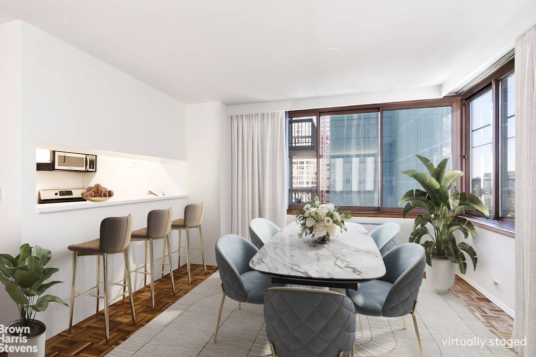 Presenting the best convertible two bedroom condominium value in Midtown at the coveted Vanderbilt Condominium, known for its 70 ft long swimming pool and double level health club.