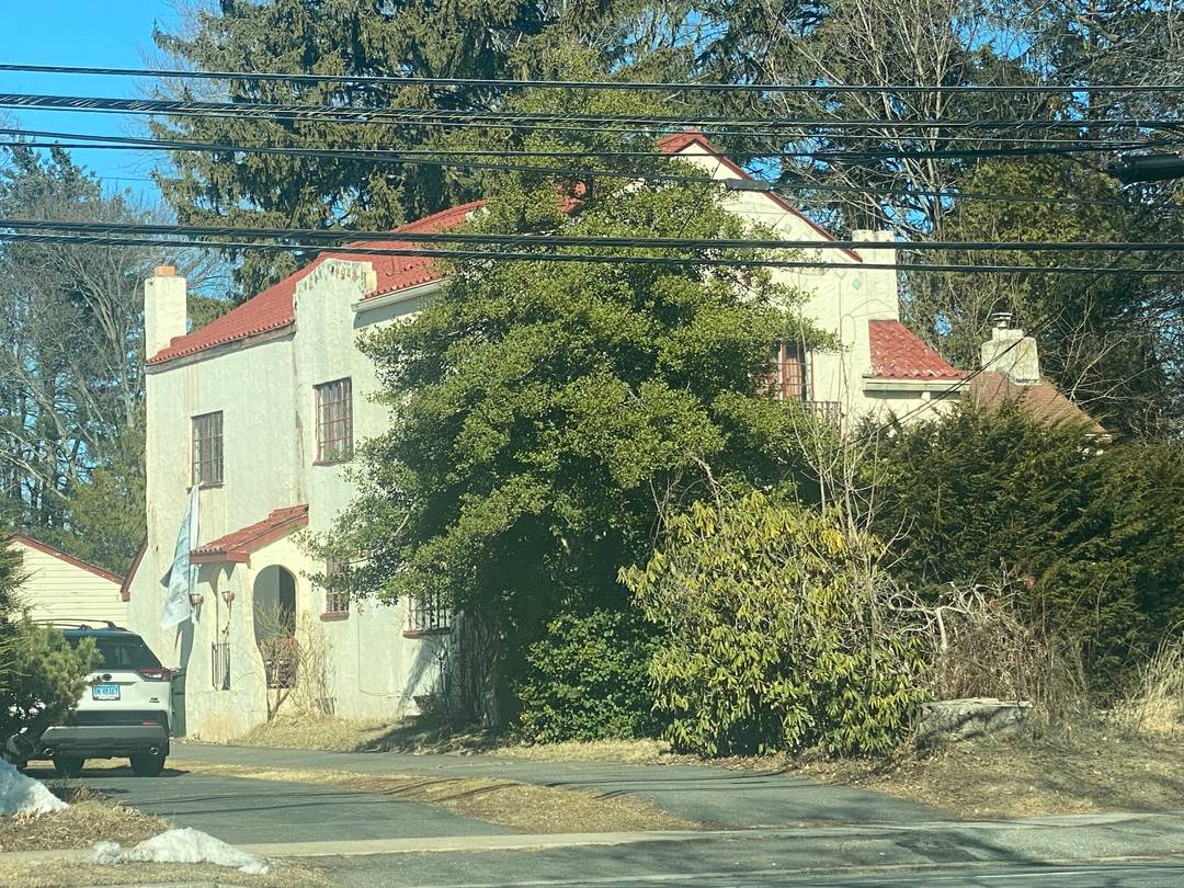 This is a Colonial Style Home near West Hartford center that has 4 bedrooms, 3.