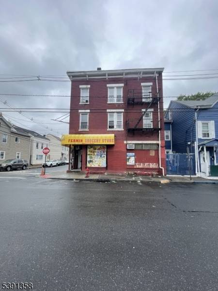 Opportunity Knocks ! For sale for the first time in generations, 6 unit building including 1 store front, 1 3 br apt and 4 2 bedrm apts.