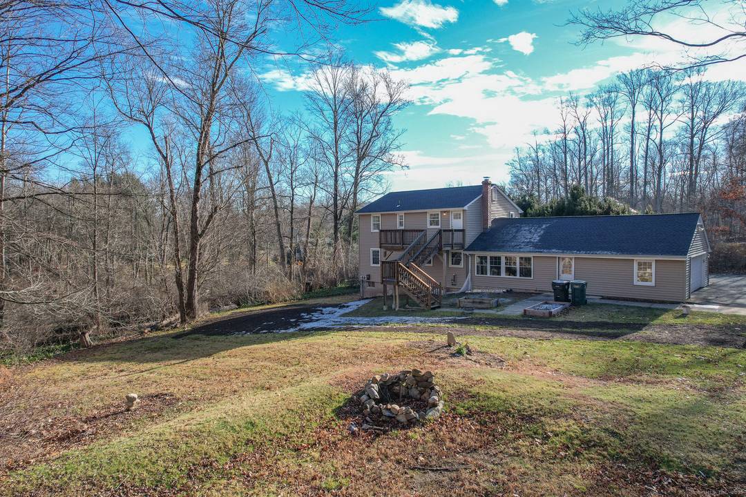 Welcome to this charming 4 bedroom, 2 bath home set on a picturesque 2 acre lot offering exceptional privacy and space to enjoy the outdoors.