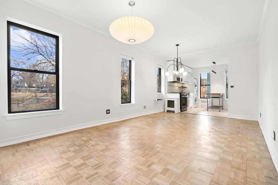 Welcome home to this thoughtfully renovated Harlem residence that effortlessly blends classic charm with modern sophistication.