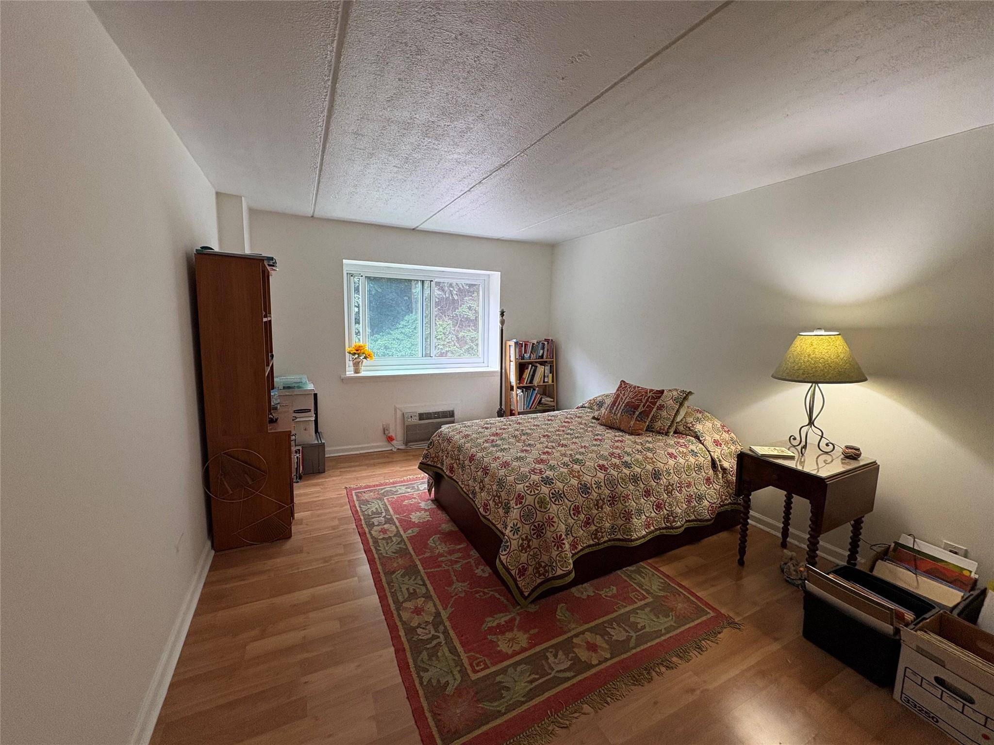 Welcome to this beautifully maintained one bedroom, one bathroom condo at Halston House featuring a spacious and open living room, perfect for relaxing or entertaining.