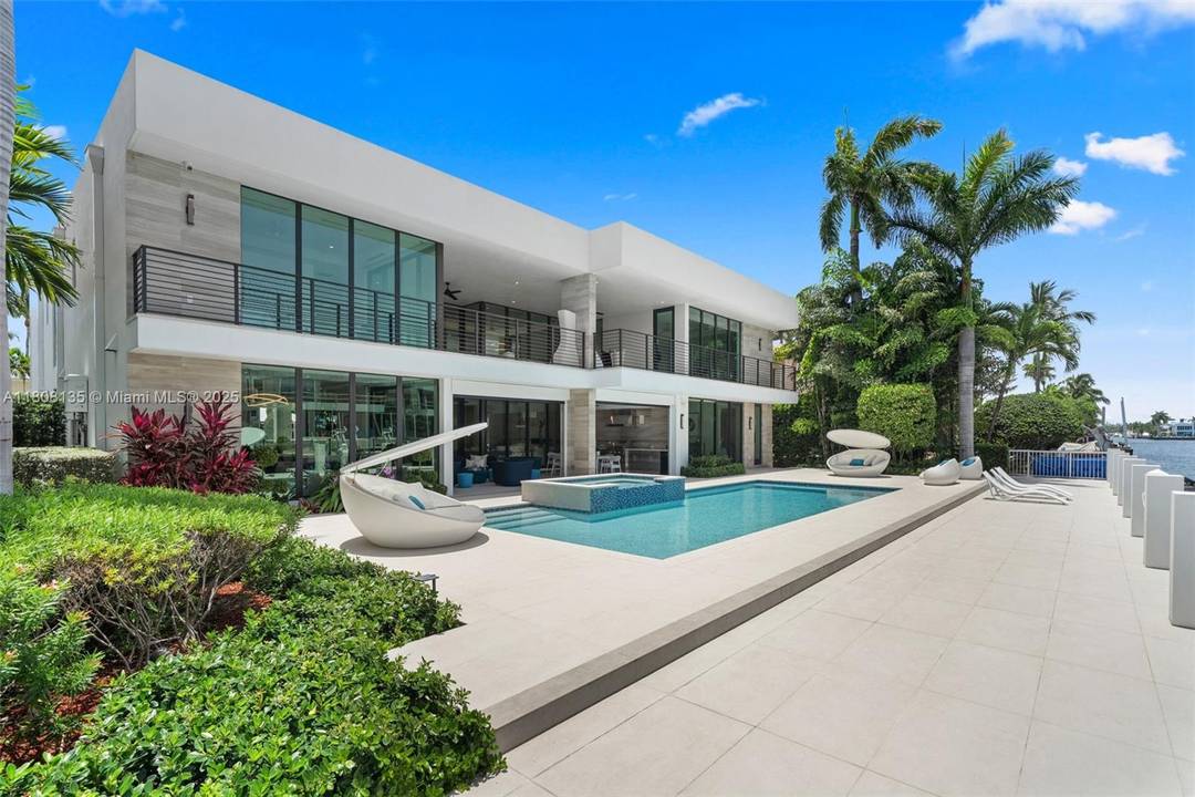 The Lucille Estate. Coastal Modern Masterpiece in Harbor Beach 95 Feet of Deepwater Canal Frontage Concrete Dock No Fixed Bridges Direct Ocean Access Expansive Resort Style Outdoor Living Covered Deck ...