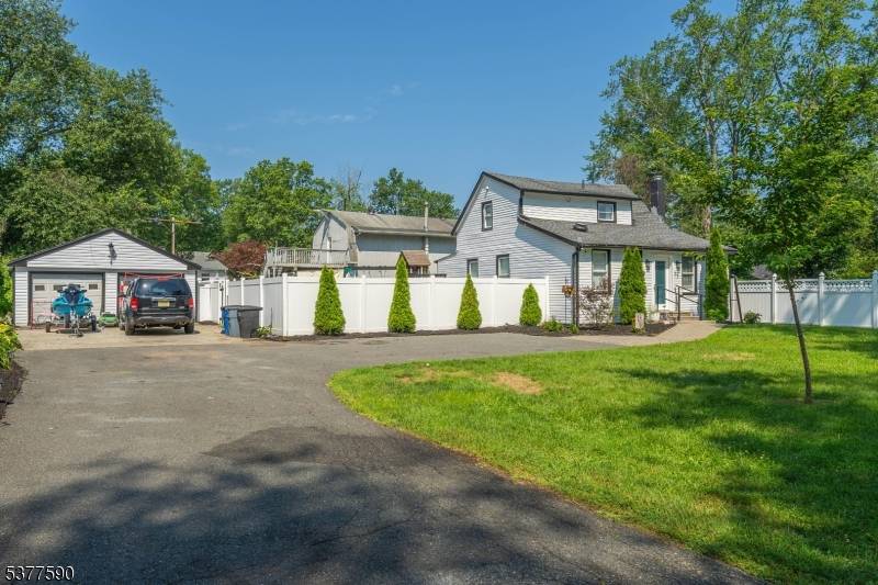 Welcome Home ! Fall in love with this charming Cape Cod style single family home offering 3 inviting bedrooms and 2 beautifully appointed full bathrooms.