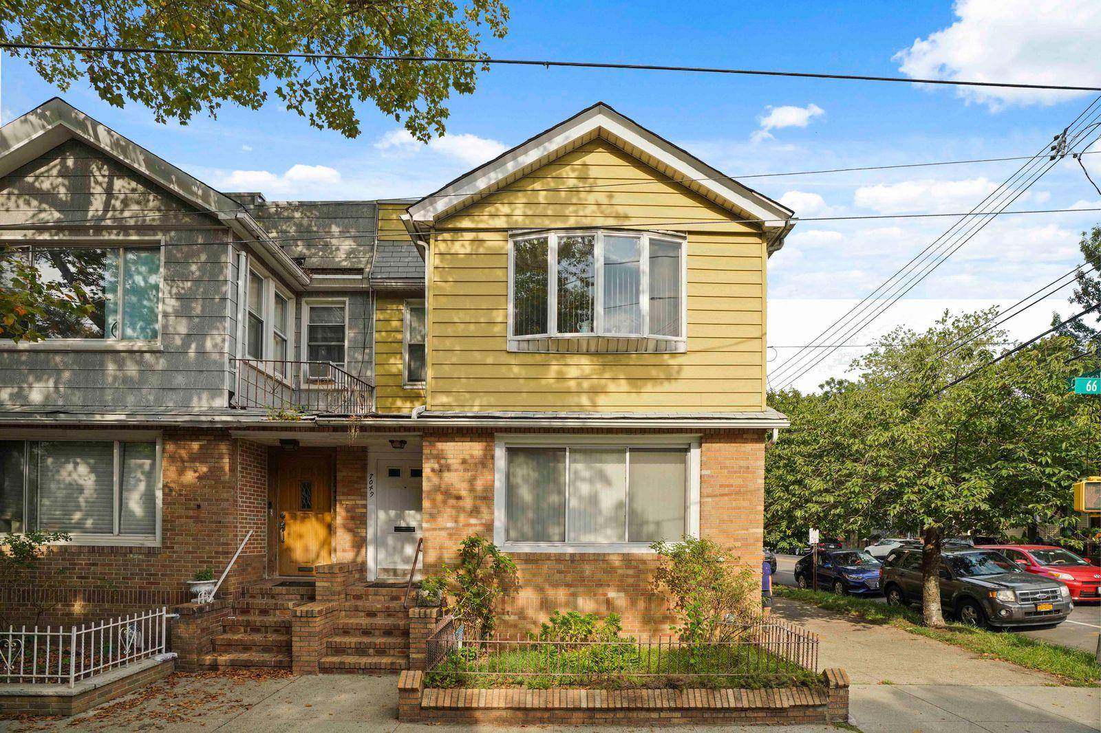 Large 2 Family home situated on a corner lot with 2 detached garages.