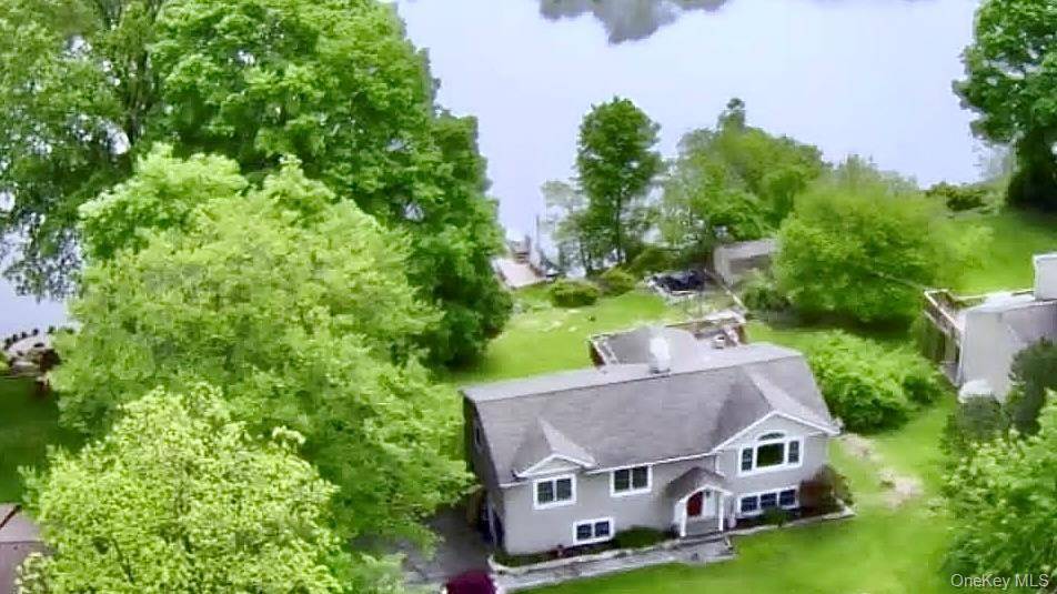 Imagine waking up to breathtaking lake views in your private Lake MacGregor oasis !