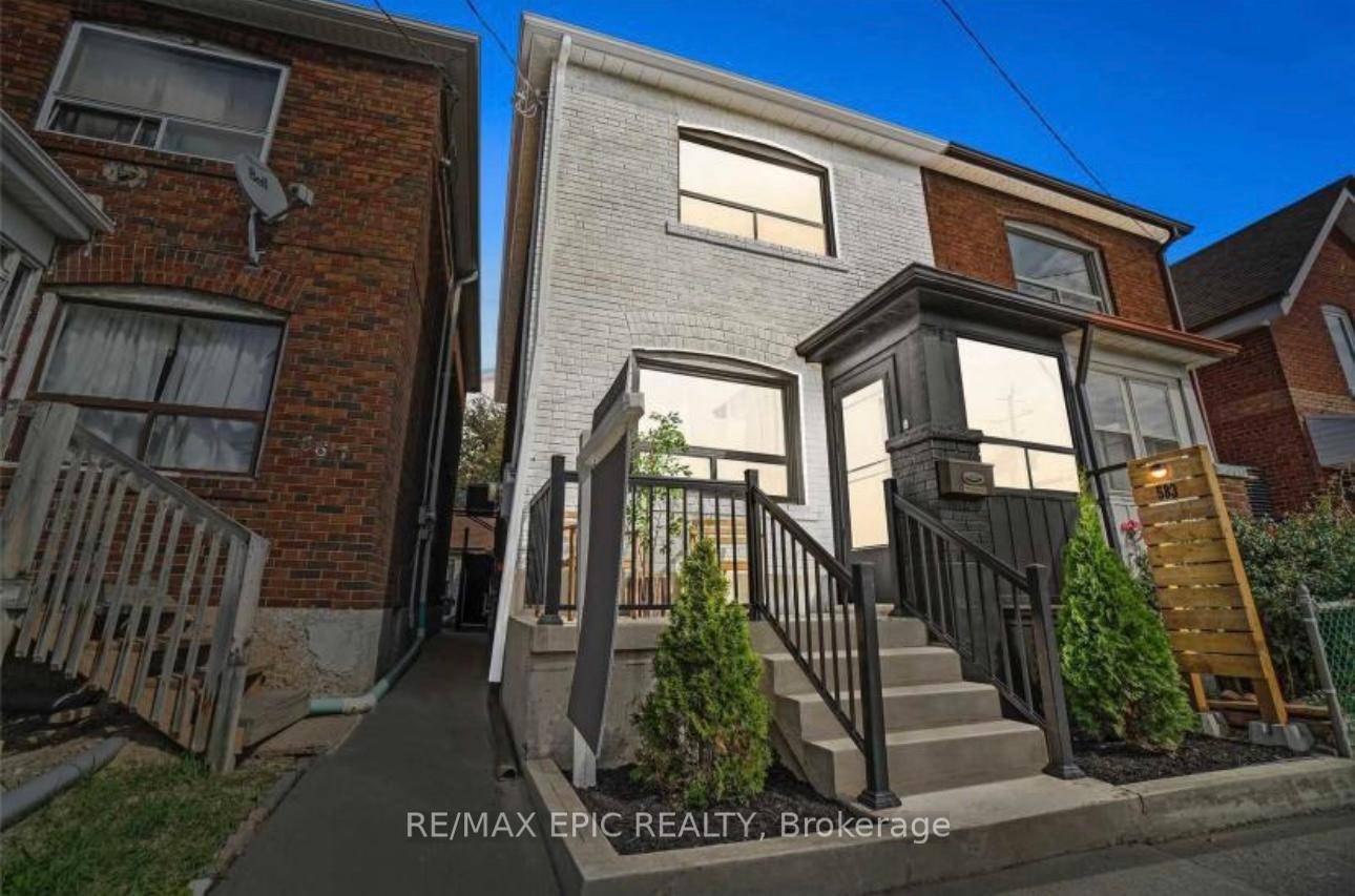 Welcome To This Solid All Brick Semi In An Extremely Desirable Midtown Neighborhood.