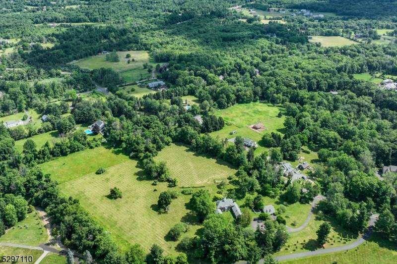 Magnificent 8. 7 Acre building lot with Storied Carriage House, formerly the stable complex of United States Golf Association.